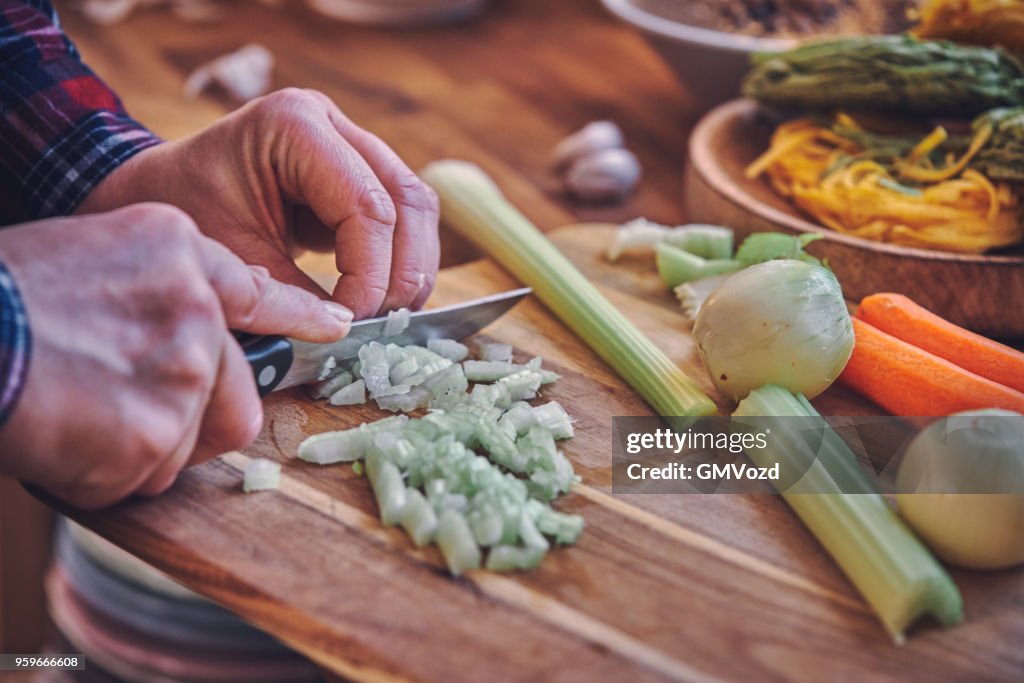 Preparing Tagliatelle Pasta with Vegan Bolognese and Bella Lodi Cheese