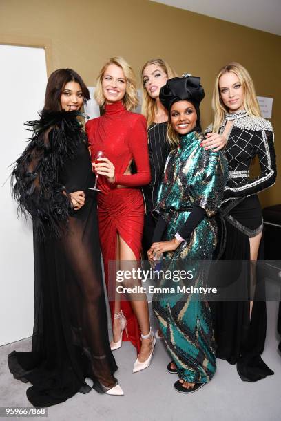 Danielle Herrington, Hailey Clauson, Daphne Groeneveld, Halima Aden and Hannah Ferguson backstage at the amfAR Gala Cannes 2018 at Hotel du...