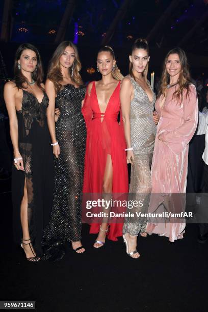 Isabeli Fontana, Lorena Rae and guests attend the amfAR Gala Cannes 2018 dinner at Hotel du Cap-Eden-Roc on May 17, 2018 in Cap d'Antibes, France.