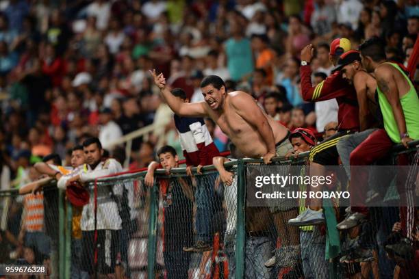 Venezuela's Deportivo Lara supporters react during their 2018 Copa Libertadores football match against Brazil's Corinthians, at the Metropolitano de...