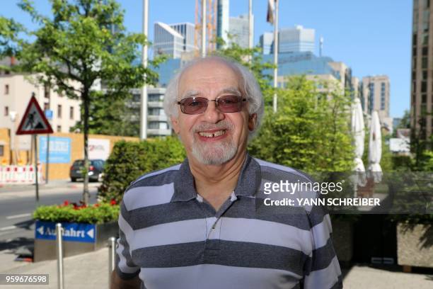 Ralph Dannheisser, born in 1938 and whose family fled the nazi regime to the US in 1940, poses for a photo in Frankfurt am Main on May 8, 2018. -...