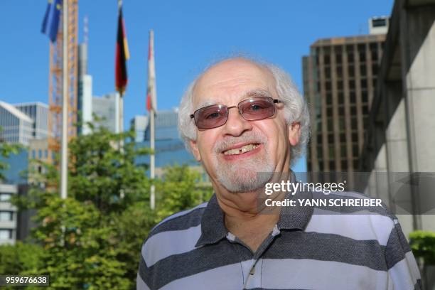 Ralph Dannheisser, born in 1938 and whose family fled the nazi regime to the US in 1940, poses for a photo in Frankfurt am Main on May 8, 2018. -...