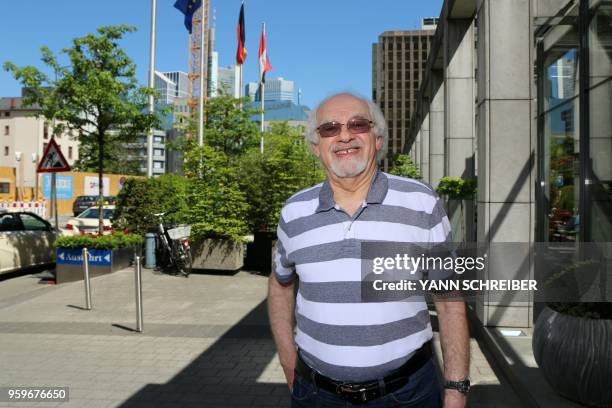 Ralph Dannheisser, born in 1938 and whose family fled the nazi regime to the US in 1940, poses for a photo in Frankfurt am Main on May 8, 2018. -...