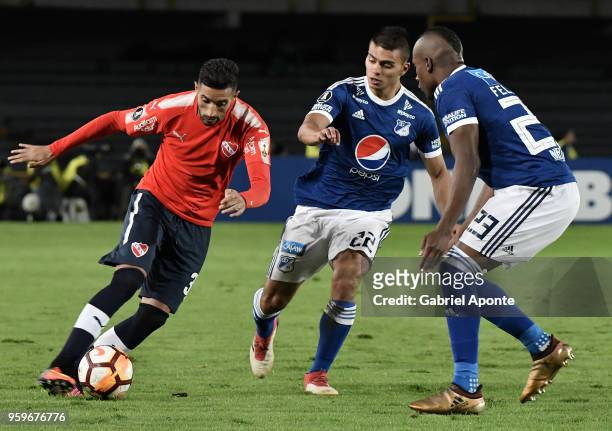 Gonzalo Veron of Independiente fights for the ball with Jhon Duque Arias and Felipe Banguero Millan of Millonarios during a match between Millonarios...