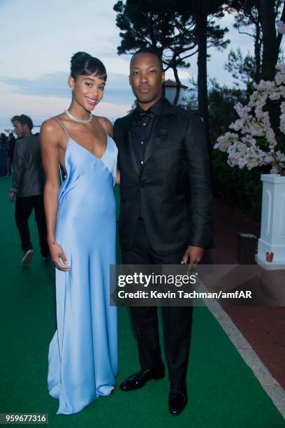 Laura Harrier and Corey Hawkins attend the cocktail at the amfAR Gala Cannes 2018 at Hotel du Cap-Eden-Roc on May 17, 2018 in Cap d'Antibes, France.