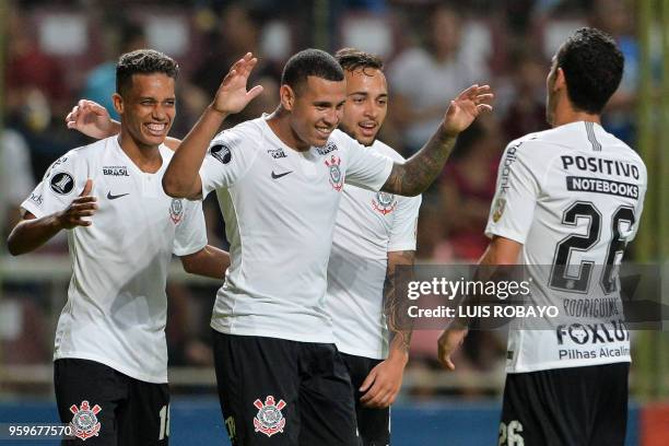 Brazil's Corinthians defender Sidcley celebrates with teammates after scoring against Venezuela's Deportivo Lara during their Copa Libertadores...