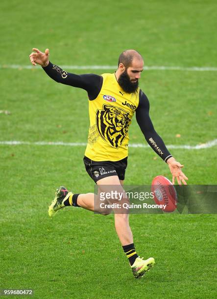 Bachar Houli of the Tigers kicks during a Richmond Tigers AFL training session at Punt Road Oval on May 18, 2018 in Melbourne, Australia.