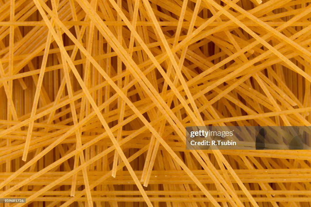 Organic whole wheat spaghetti pasta for background