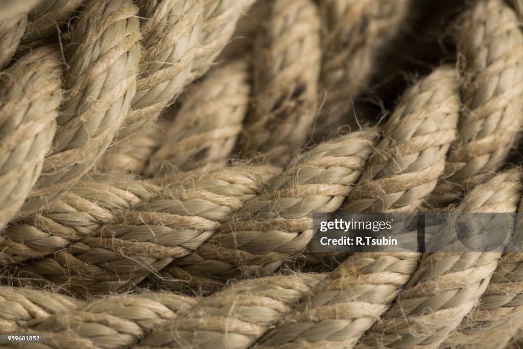 Close-up of an old frayed boat rope as a background