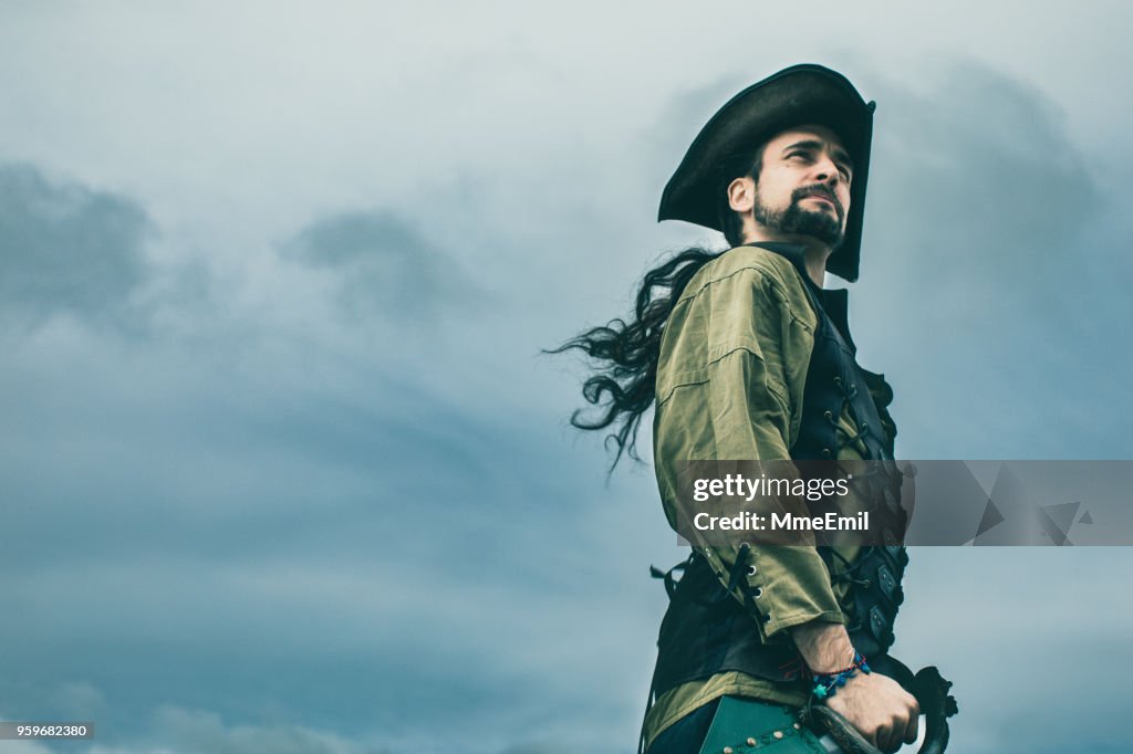 Pirate standing in front of the storm. Fantasy