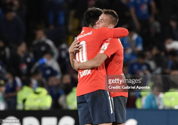 Fernando Gaibor and Braian Romero of Independiente celebrate after a match between Millonarios and Independiente as part of Copa CONMEBOL...