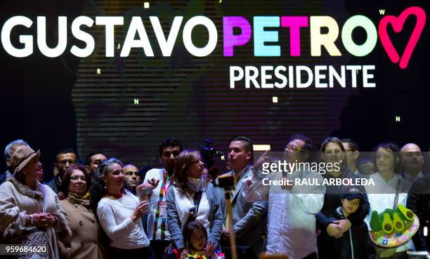 Colombian presidential candidate Gustavo Petro , from Colombia Humana party, speaks to supporters next to his wife Veronica Alcocer Garcia , during a...