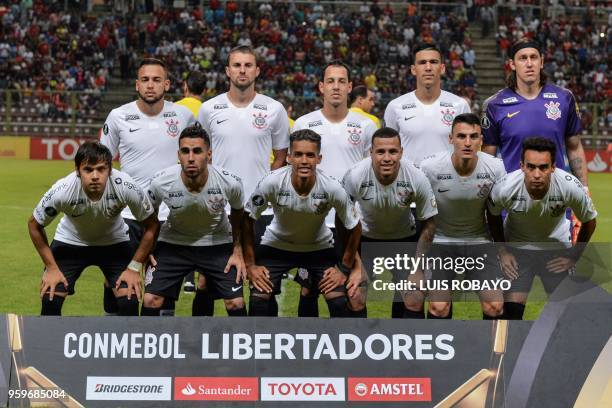 Brazil's Corinthians members pose for the picture before the start their Copa Libertadores football match against Venezuela's Deportivo Lara at...