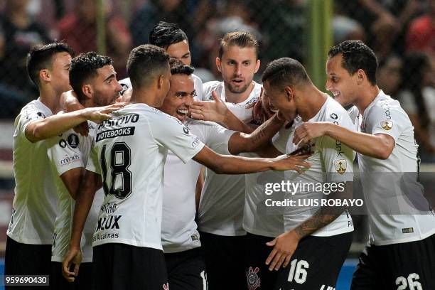 Brazil's Corinthians midfielder Jadson celebrates with his teammates after scoring against Venezuela's Deportivo Lara during their Copa Libertadores...