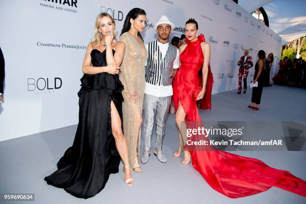 Carmen Jorda, Adriana Lima, Lewis Hamilton and Petra Nemcova arrive at the amfAR Gala Cannes 2018 at Hotel du Cap-Eden-Roc on May 17, 2018 in Cap...