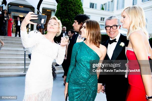 Carine Roitfeld , Karolina Kurkova and guests arrive at the amfAR Gala Cannes 2018 at Hotel du Cap-Eden-Roc on May 17, 2018 in Cap d'Antibes, France.