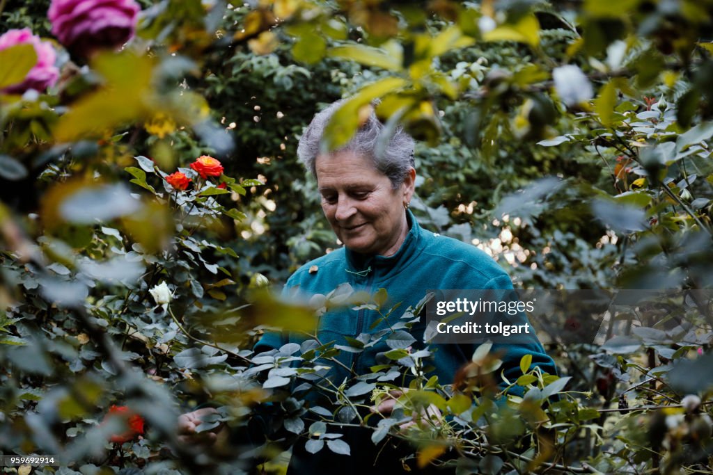 Woman with flowers in the garden