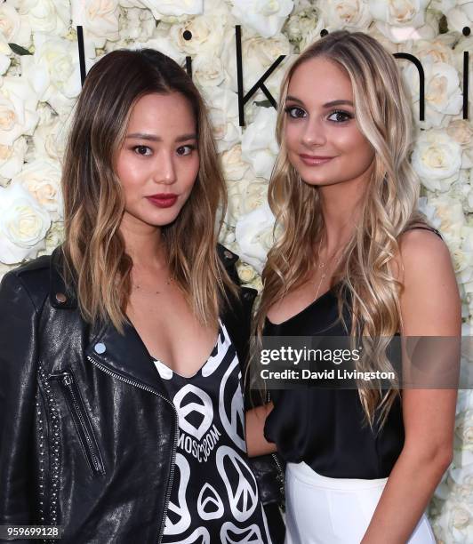 Actress Jamie Chung and designer Gigi Caruso attend the Gigi C Bikinis Pop-Up Launch Event at The Park at The Grove on May 17, 2018 in Los Angeles,...