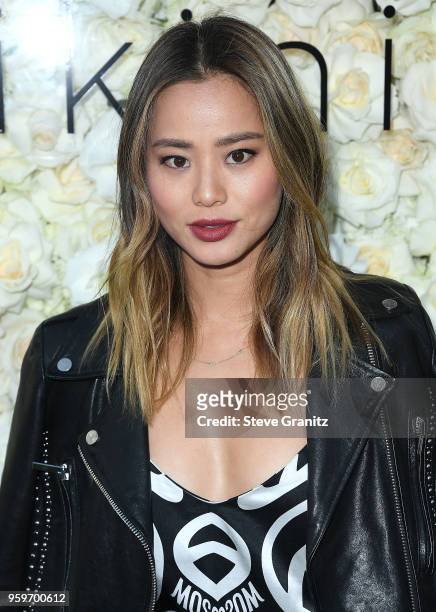 Jamie Chung arrive at the Gigi C Bikinis Pop-Up Launch Event at The Park at The Grove on May 17, 2018 in Los Angeles, California.