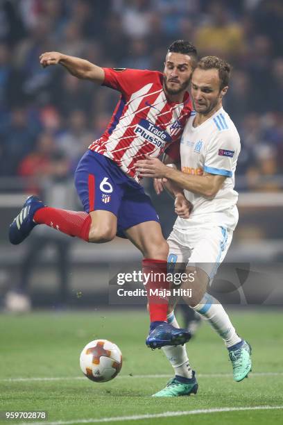 Koke of Atletico Madrid and Valere Germain of Marseille battle for the ball during the UEFA Europa League Final between Olympique de Marseille and...