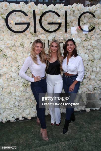 Natasha Oakley, Gigi Caruso and Devin Brugman attend the Gigi C Bikinis Pop-Up Launch Event at The Park at The Grove on May 17, 2018 in Los Angeles,...