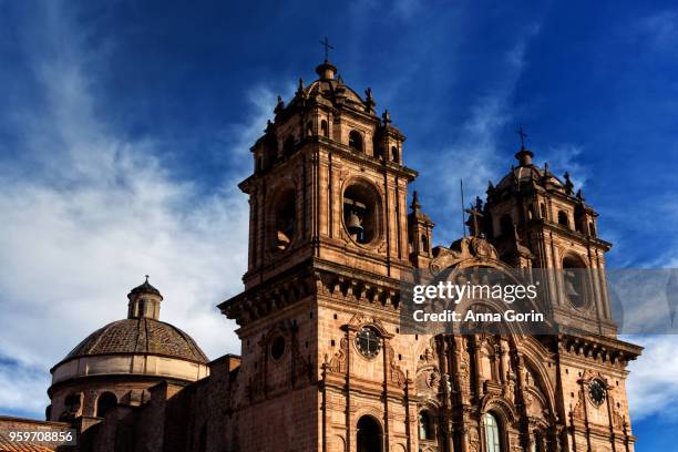 iglesias de la compania de jesus facade on spring afternoon in plaza de armas, cusco, peru - anna gorin stock pictures, royalty-free photos & images