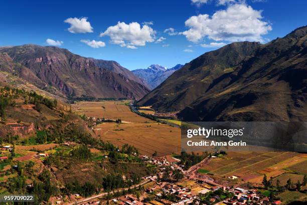 high angle view of village of taray in sacred valley of peru, autumn afternoon - anna gorin stock pictures, royalty-free photos & images