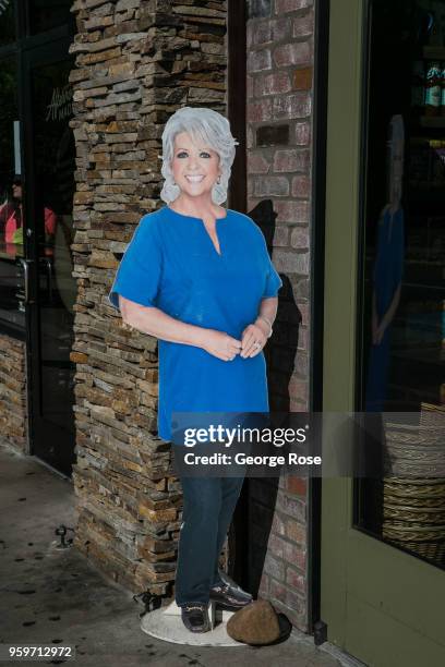 Cardboard cut-out of culinary celebrity Paula Deen greets visitors to her store on May 11, 2018 in Gatlinburg, Tennessee. Situated near the entrance...