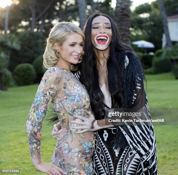 Paris Hilton and Winnie Harlow attend the cocktail at the amfAR Gala Cannes 2018 at Hotel du Cap-Eden-Roc on May 17, 2018 in Cap d'Antibes, France.