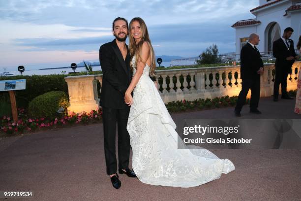 Heidi Klum and Tom Kaulitz attend the amfAR Gala Cannes 2018 dinner at Hotel du Cap-Eden-Roc on May 17, 2018 in Cap d'Antibes, France.