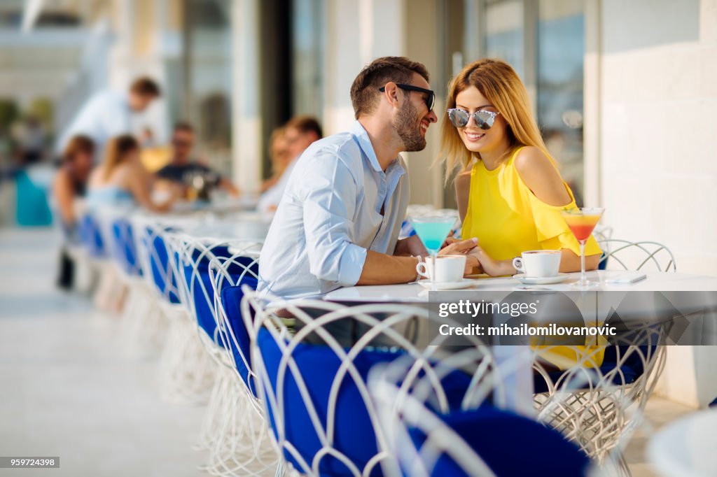 Happy couple in a cafe