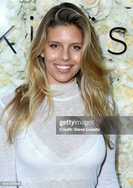 Natasha Oakley arrive at the Gigi C Bikinis Pop-Up Launch Event at The Park at The Grove on May 17, 2018 in Los Angeles, California.