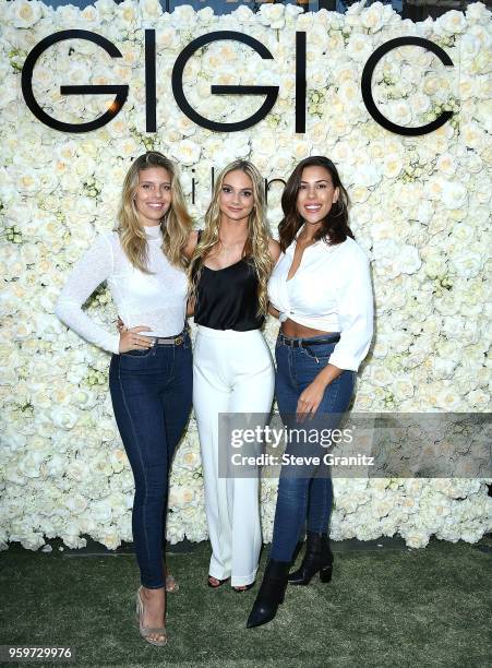 Natasha Oakley, Gigi Caruso, Devin Brugman arrive at the Gigi C Bikinis Pop-Up Launch Event at The Park at The Grove on May 17, 2018 in Los Angeles,...