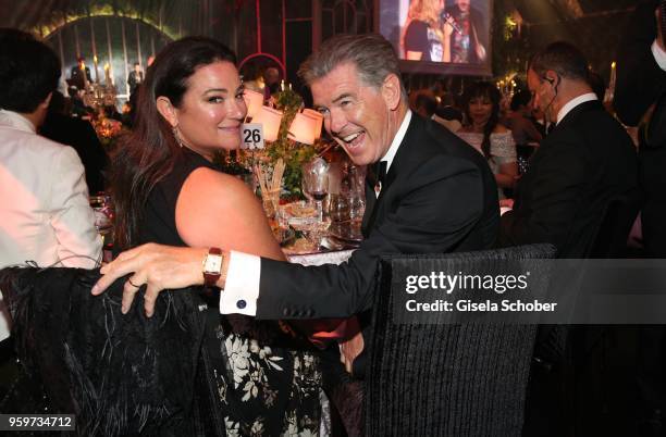 Pierce Brosnan and his wife Keely Shaye Smith during the amfAR Gala Cannes 2018 dinner at Hotel du Cap-Eden-Roc on May 17, 2018 in Cap d'Antibes,...
