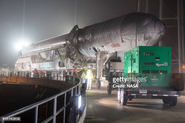 In this NASA handout, An Orbital ATK rocket is seen as it is rolled out to launch Pad-0A at Wallops Flight Facility in advance of a Sunday launch on...