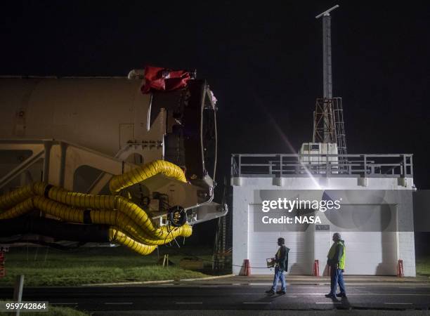 In this NASA handout, An Orbital ATK rocket is seen as it is rolled out to launch Pad-0A at Wallops Flight Facility in advance of a Sunday launch on...