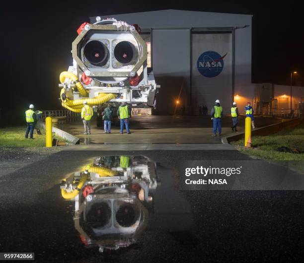 In this NASA handout, An Orbital ATK rocket is seen as it is rolled out to launch Pad-0A at Wallops Flight Facility in advance of a Sunday launch on...