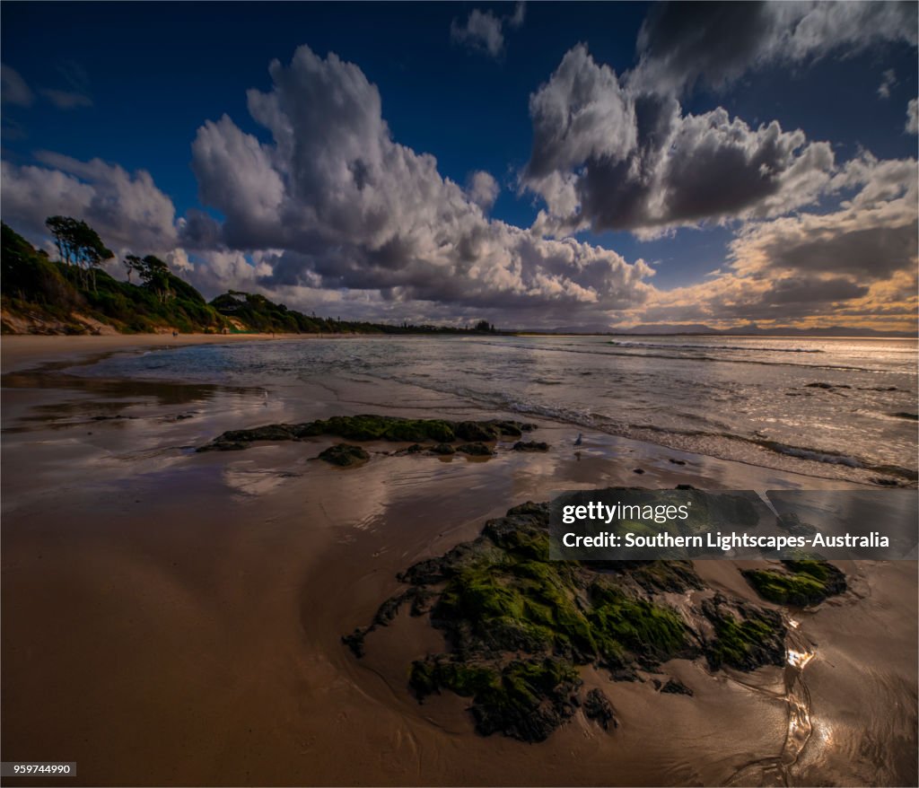 Reflections on the beach at low-tide, Byron Bay, New south Wales, Australia.