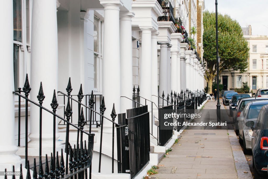 Residential townhouses and pedestrian walkway in Notting Hill, England, UK