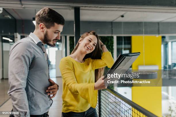 teamwork and technology, indispensable tools for corporate productivity - indispensable stock pictures, royalty-free photos & images