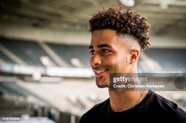 Keanan Bennetts pose after he signs a new contract for Borussia Moenchengladbach at Borussia-Park on May 18, 2018 in Moenchengladbach, Germany.