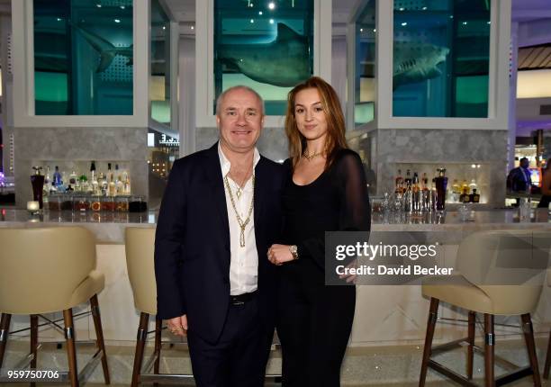 Artist Damien Hirst and actress Sophie Cannell attend the From Dust To Gold preview party at the Palms Casino Resort on May 17, 2018 in Las Vegas,...