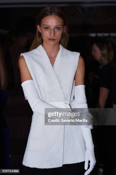 Model poses backstage ahead of the Christopher Esber show at Mercedes-Benz Fashion Week Resort 19 Collections at MCM House on May 16, 2018 in Sydney,...