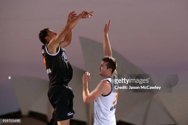 Mensud Julevic of Kranj shoots over Andrew Steel of Melbourne i-Athletic during Sydney FIBA 3x3 World Challenger event hosted by the NBL held at the...