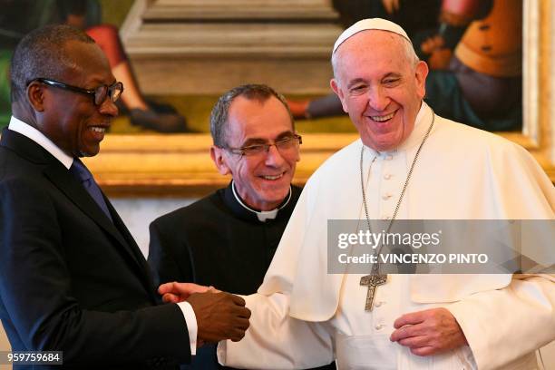 Pope Francis speaks with the President of Benin, Patrice Talon during a private audience on May 18, 2018 at the Vatican.