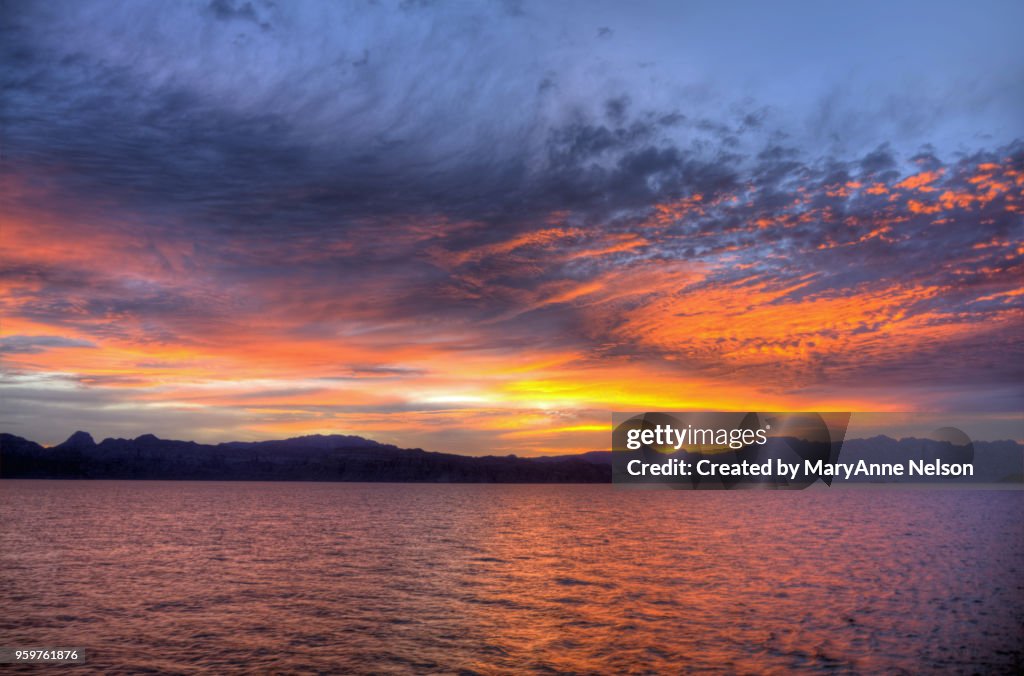 Clouds and Water that Look on Fire at Sunset