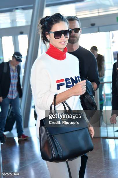 Adriana Lima is seen arriving at Nice Airport during the 71st annual Cannes Film Festival at Nice Airport on May 18, 2018 in Nice, France.