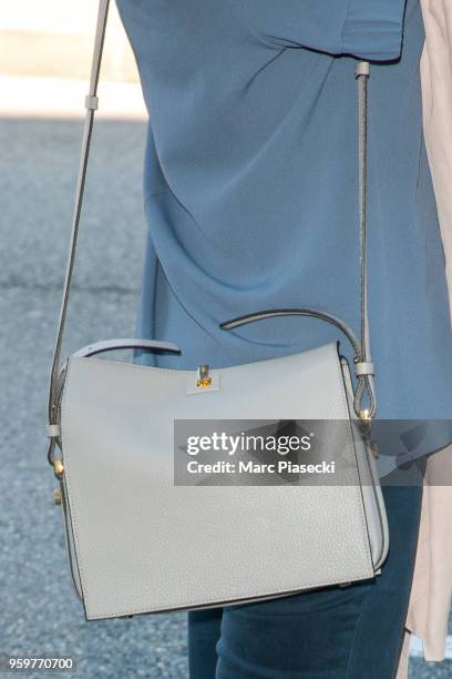 Actress Aure Atika, handbag detail, is seen during the 71st annual Cannes Film Festival at Nice Airport on May 18, 2018 in Nice, France.