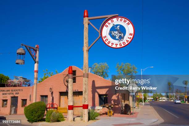 old fashioned sign at street corner of old town scottsdale, az - old town scottsdale stock pictures, royalty-free photos & images