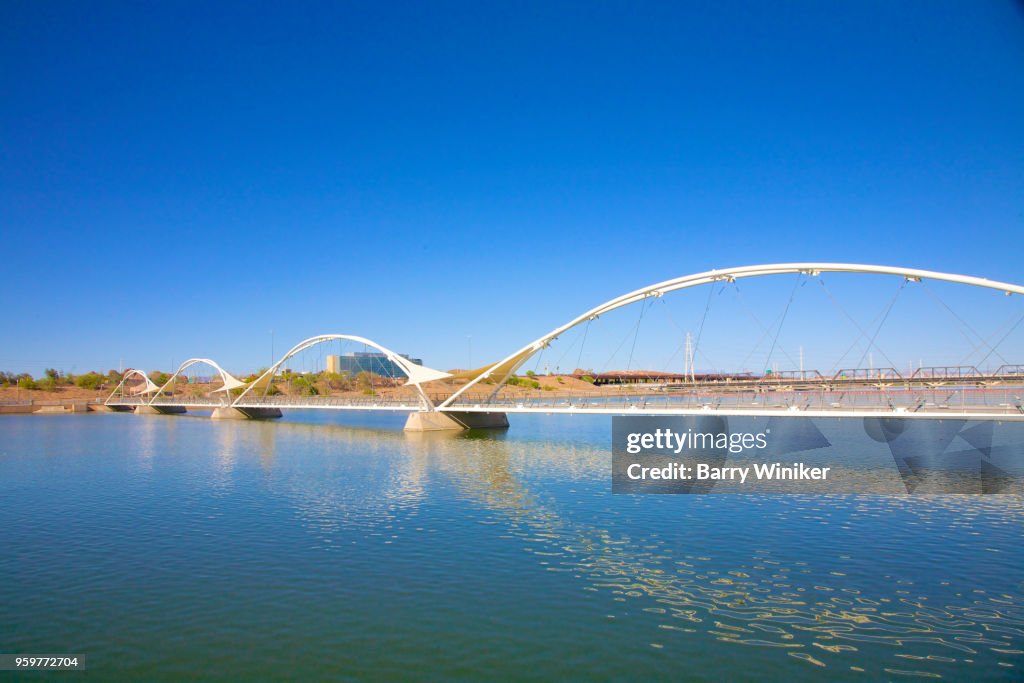 Bridge with arches over water in Tempe, AZ